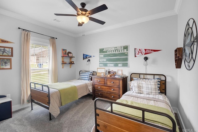 bedroom with carpet floors, ornamental molding, and ceiling fan