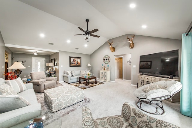 living room with lofted ceiling, light carpet, and ceiling fan