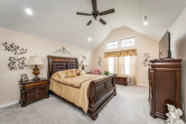 carpeted bedroom with lofted ceiling and ceiling fan