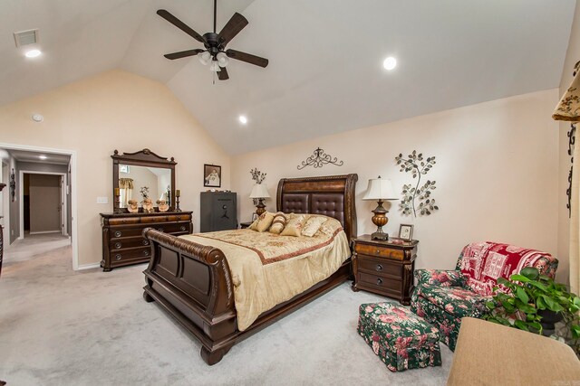 bedroom with vaulted ceiling, light carpet, and ceiling fan