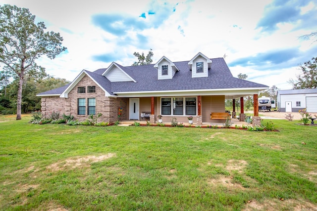 view of front facade featuring a front yard and a porch