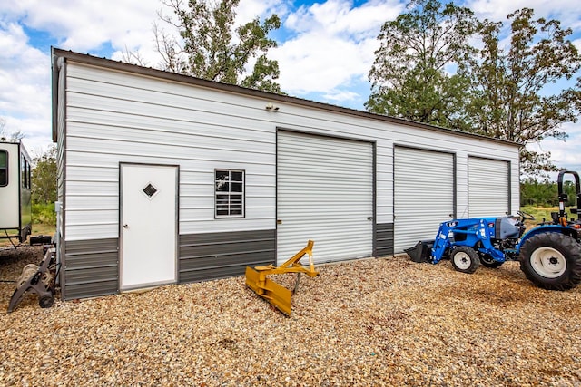 view of outbuilding with a garage