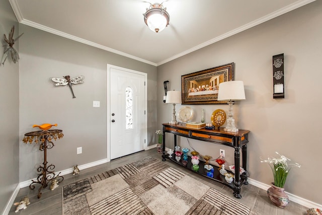 entryway with ornamental molding and dark hardwood / wood-style floors