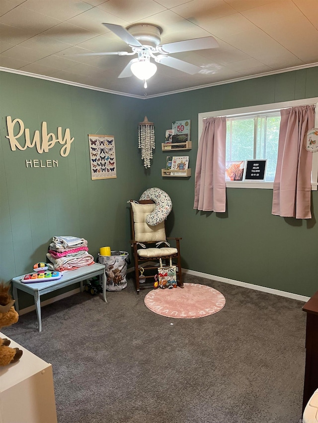 bedroom featuring ornamental molding, ceiling fan, and carpet flooring