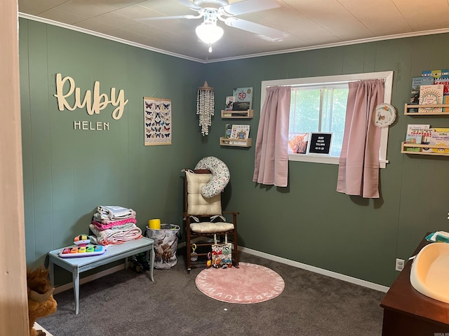 recreation room with ceiling fan, ornamental molding, sink, and carpet flooring