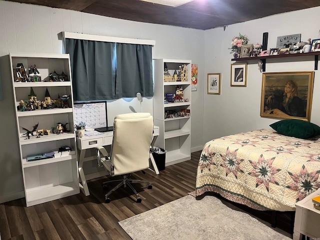 bedroom featuring dark hardwood / wood-style floors