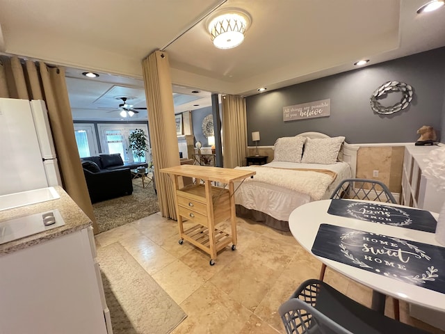 bedroom with white refrigerator