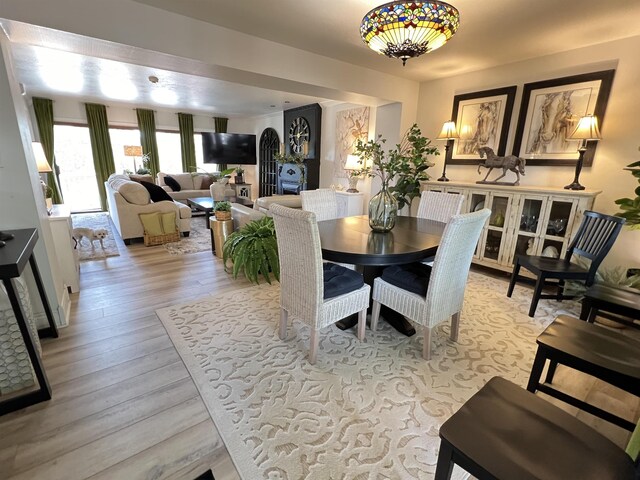 dining area with light hardwood / wood-style floors