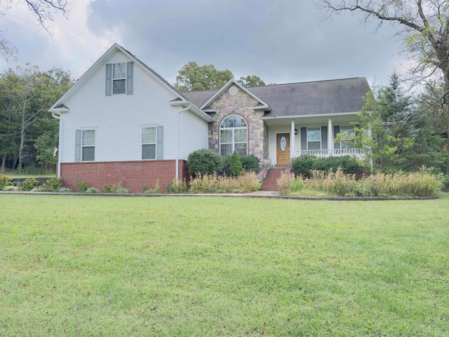 view of front facade with a porch and a front lawn