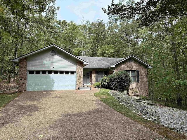 ranch-style home with a garage