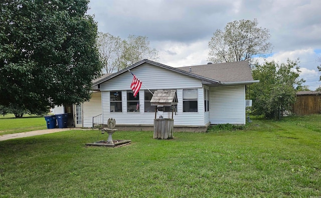 view of front of property with a front lawn