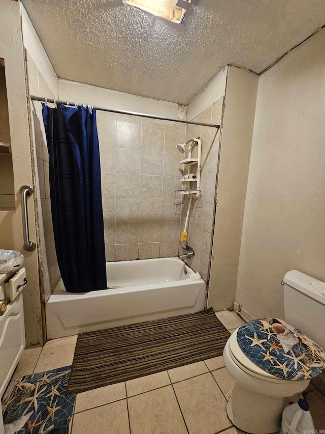 bathroom with toilet, shower / tub combo, tile patterned floors, and a textured ceiling