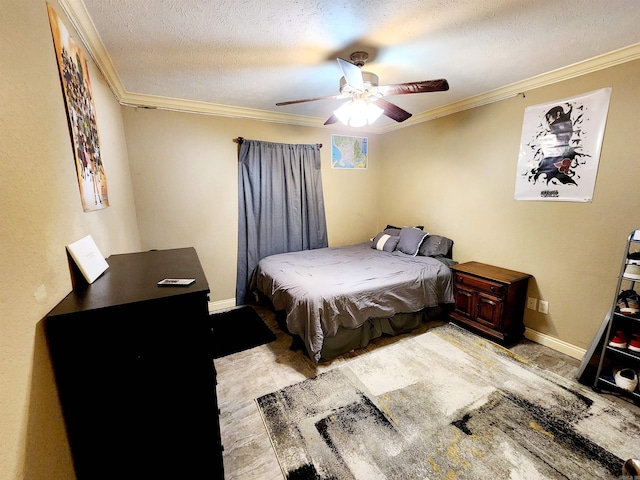 bedroom with ceiling fan, crown molding, and a textured ceiling