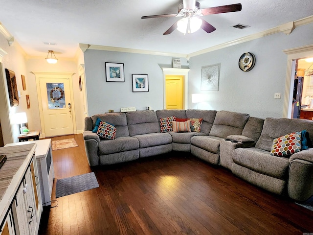 living room featuring crown molding, dark hardwood / wood-style flooring, and ceiling fan