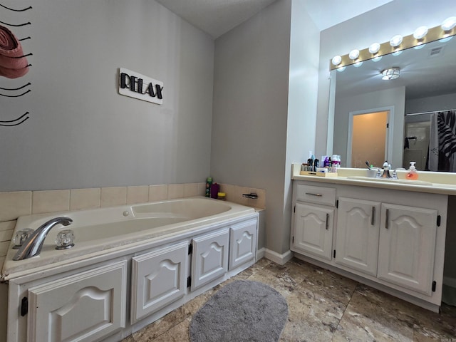 bathroom featuring vanity and shower with separate bathtub