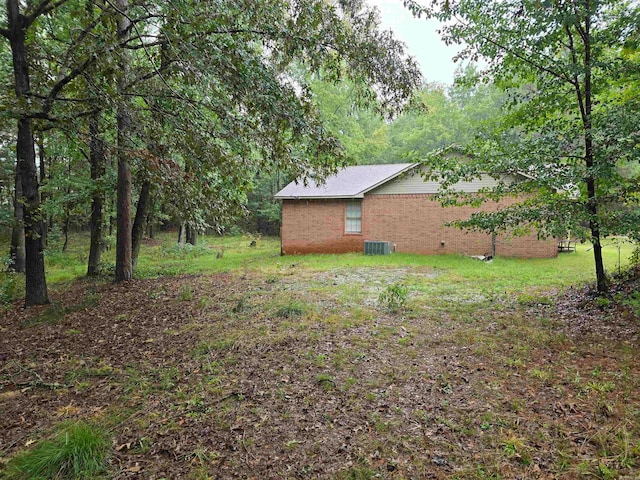 view of yard featuring central AC