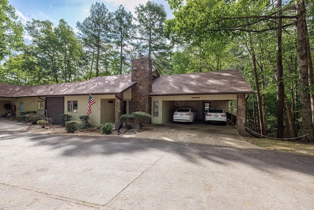 single story home featuring a garage