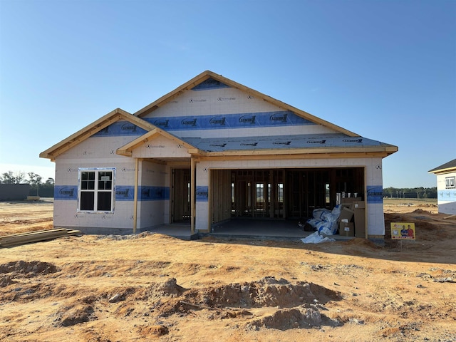 property under construction featuring an outbuilding