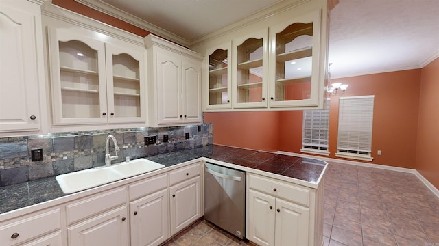 kitchen featuring white cabinets, sink, kitchen peninsula, stainless steel dishwasher, and backsplash