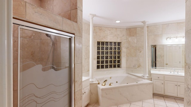 bathroom with vanity, tile walls, tile patterned flooring, and separate shower and tub