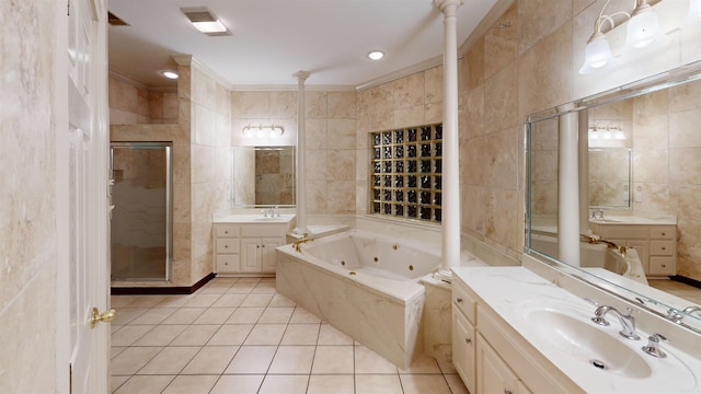 bathroom with tile walls, vanity, separate shower and tub, and ornamental molding