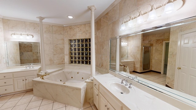 bathroom with ornamental molding, tile walls, vanity, and separate shower and tub