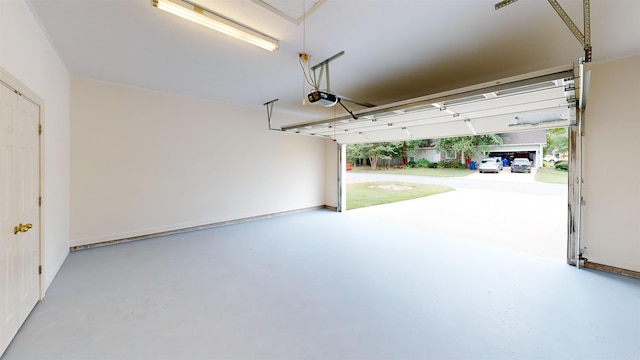 garage featuring a garage door opener