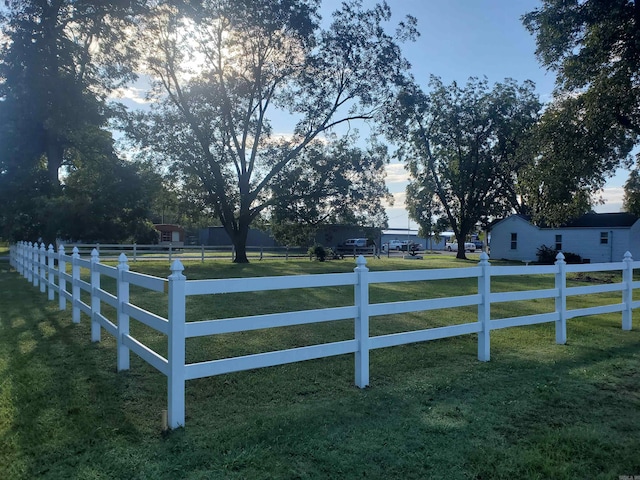 view of yard with a rural view