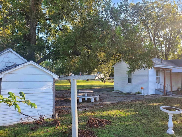 exterior space with a shed