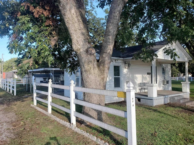 exterior space featuring a lawn