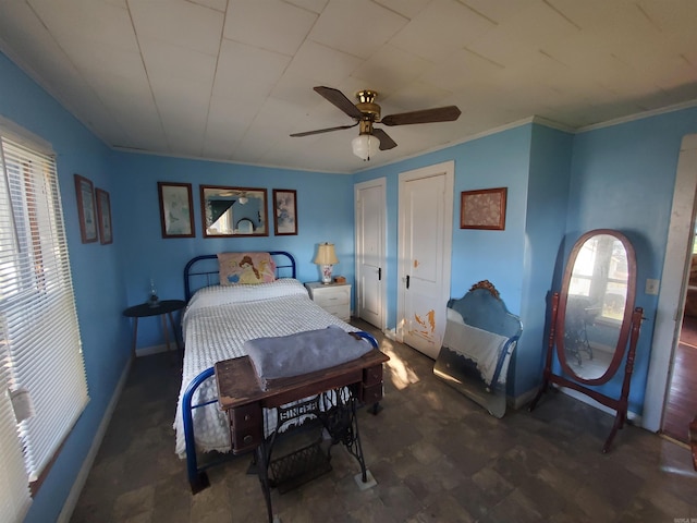 bedroom with ceiling fan and ornamental molding