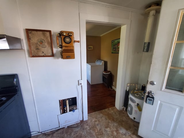 interior space with washer / clothes dryer, ornamental molding, and hardwood / wood-style floors