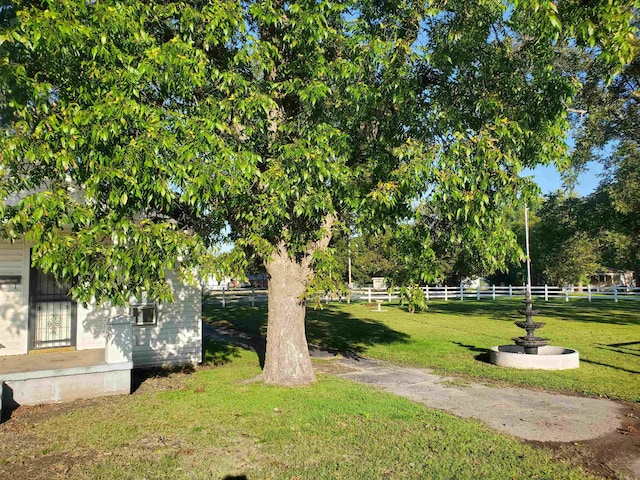 view of community with a lawn