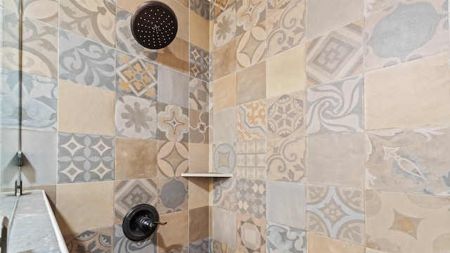 bathroom featuring tile walls and tiled shower