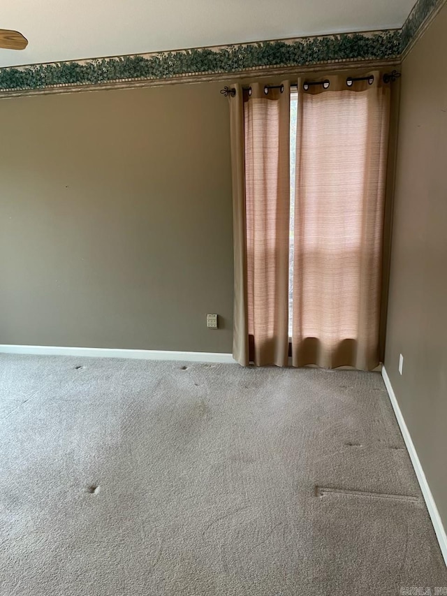 empty room with carpet flooring