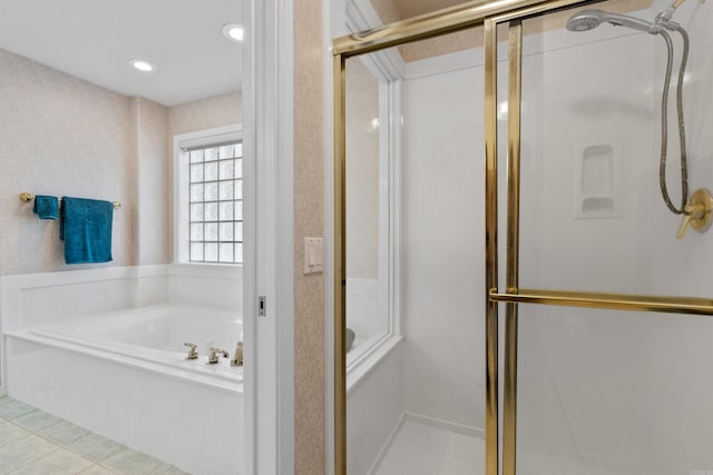 bathroom with plus walk in shower and tile patterned floors