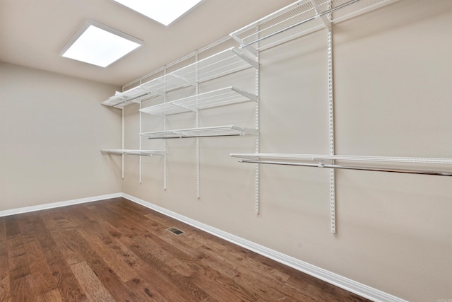 walk in closet featuring wood-type flooring