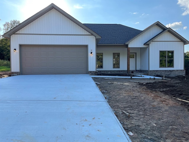 view of front of home with a garage