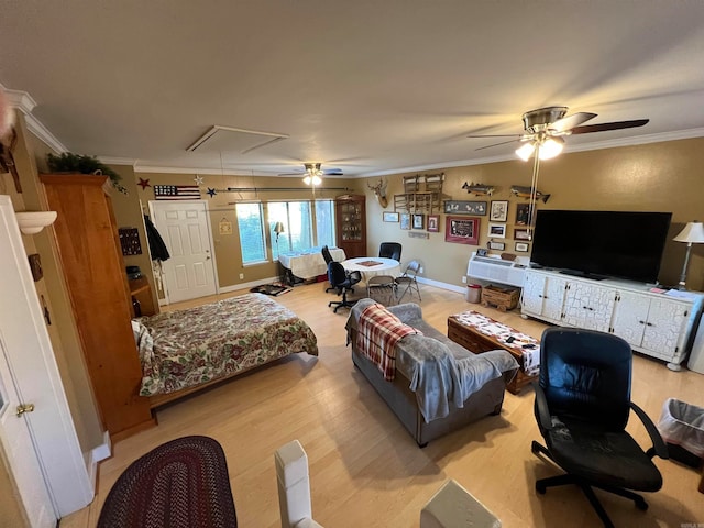 living room with ceiling fan, crown molding, and light hardwood / wood-style floors