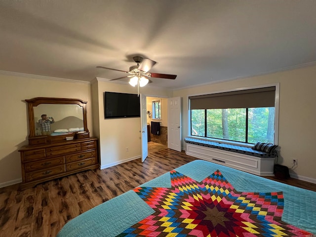 bedroom featuring crown molding, dark hardwood / wood-style flooring, and ceiling fan