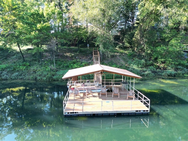 dock area featuring a water view