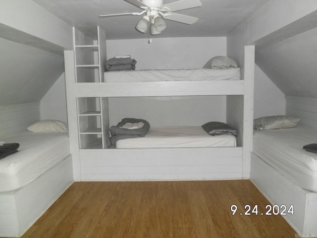 bedroom featuring ceiling fan and dark hardwood / wood-style flooring