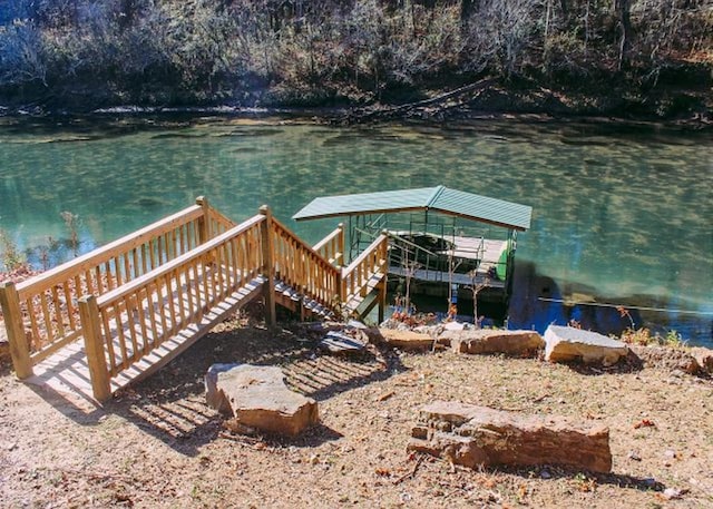 view of dock with a water view