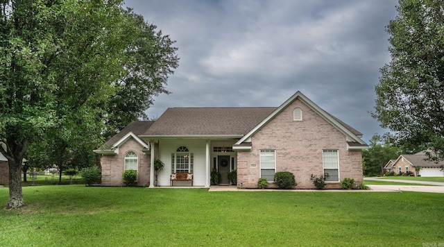 view of front of home with a front yard