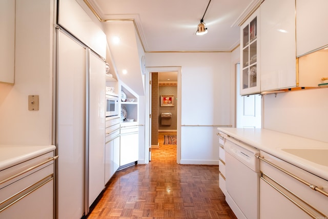 1 Treetops Unit & 1103, Little Rock, AR 72202 - kitchen featuring white appliances, light countertops, glass insert cabinets, white cabinetry, and ornamental molding
