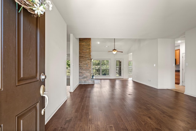 foyer entrance with ceiling fan and dark hardwood / wood-style floors