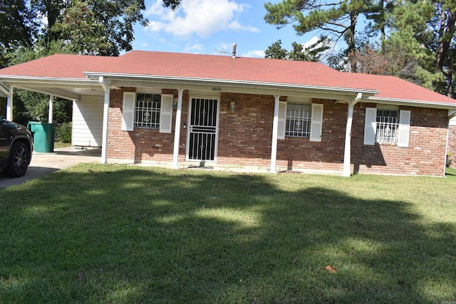 ranch-style house with a carport and a front yard