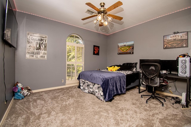 bedroom with ceiling fan and carpet