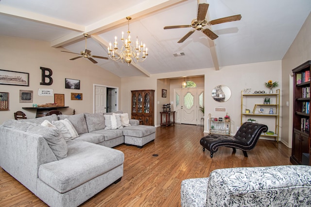 living room with vaulted ceiling with beams, hardwood / wood-style flooring, and ceiling fan with notable chandelier