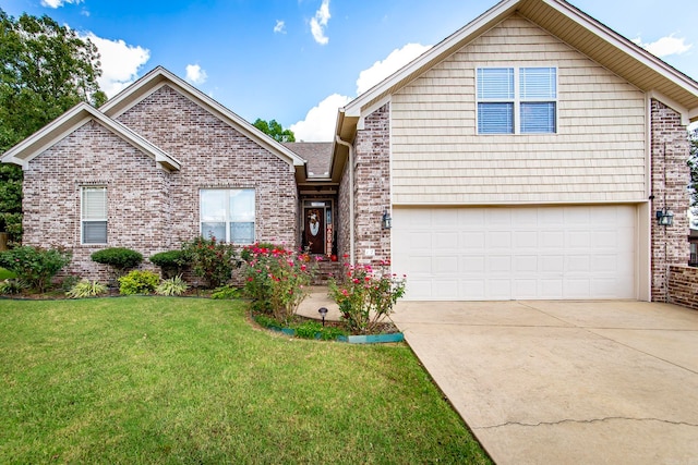 view of front property with a garage and a front lawn